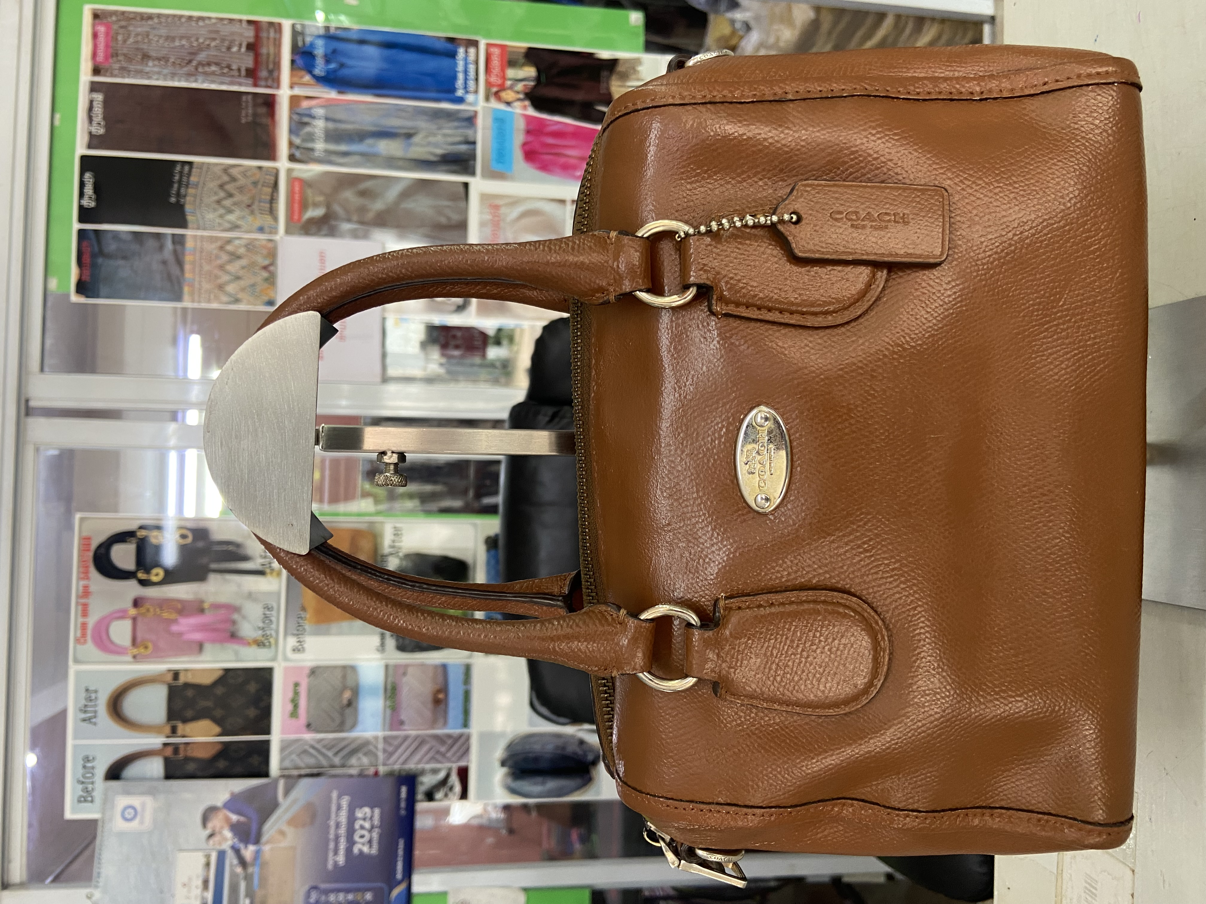 ກະເປົາໂຄດ coach