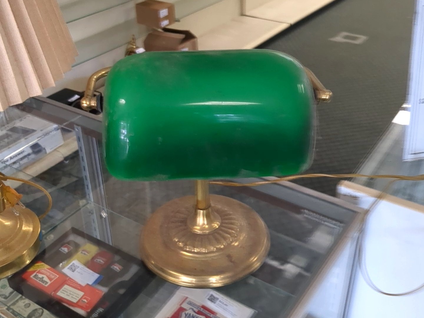Banker's lamp with green glass shade and brass base