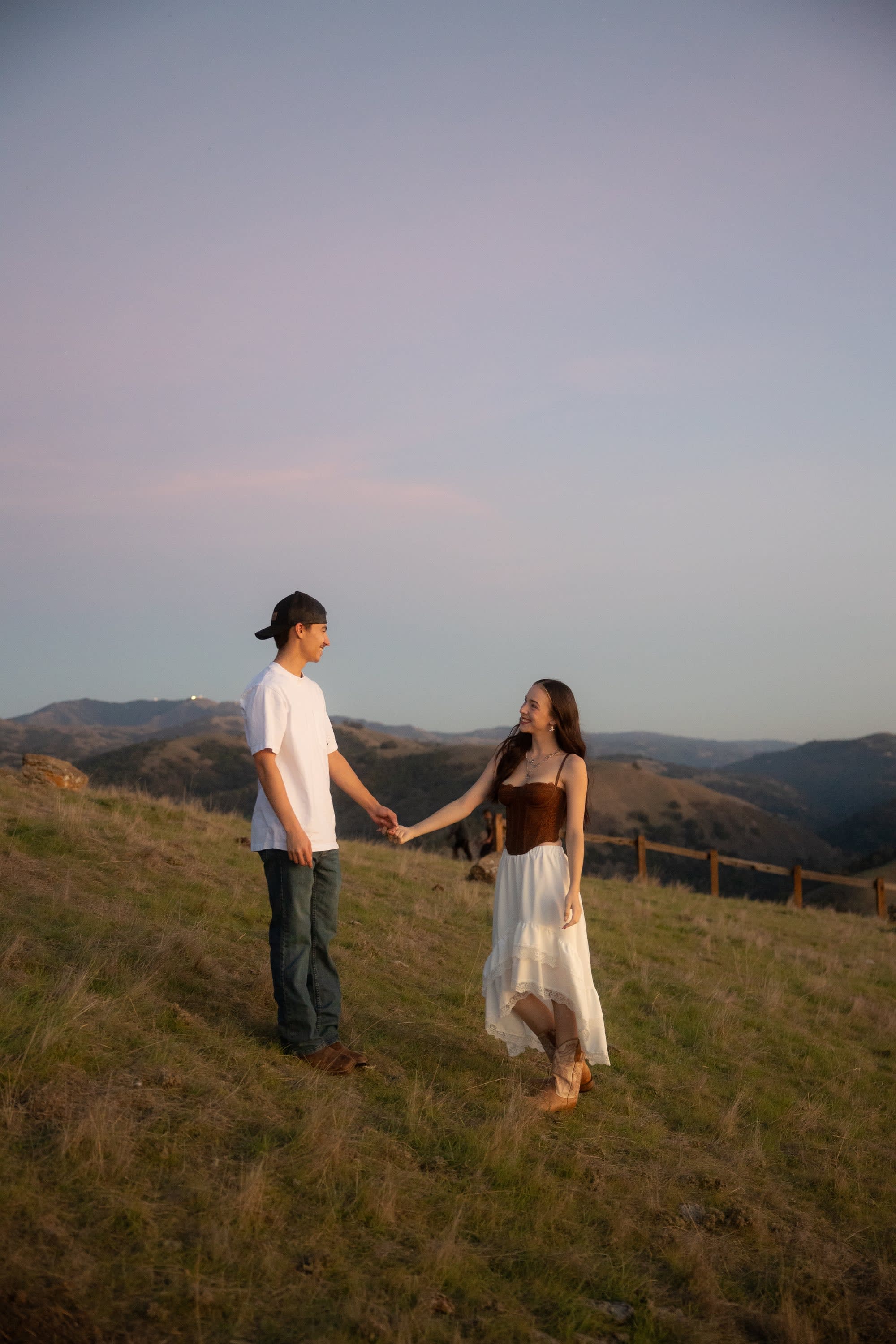 A couple in a field at the Sierra Vista Open Space Preserve