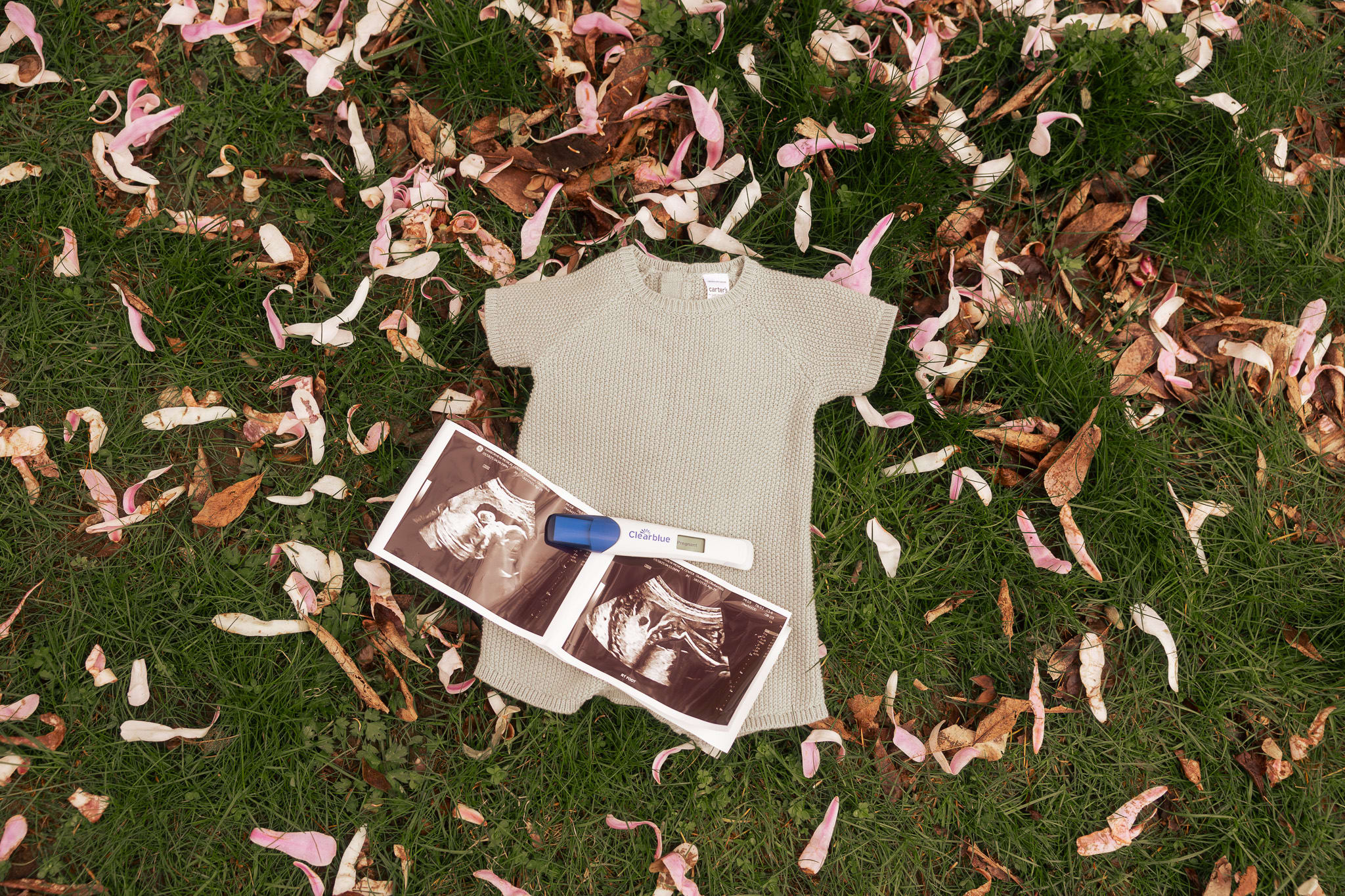 baby clothes on grass