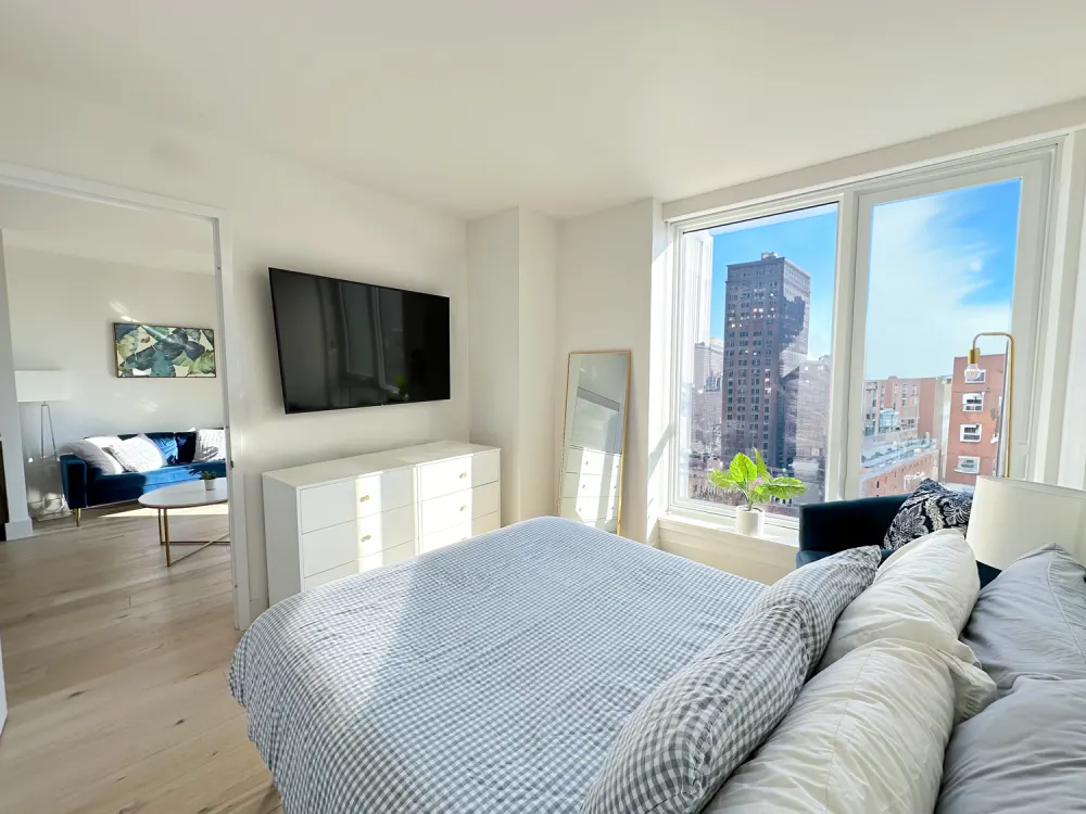 Bright bedroom with city views.