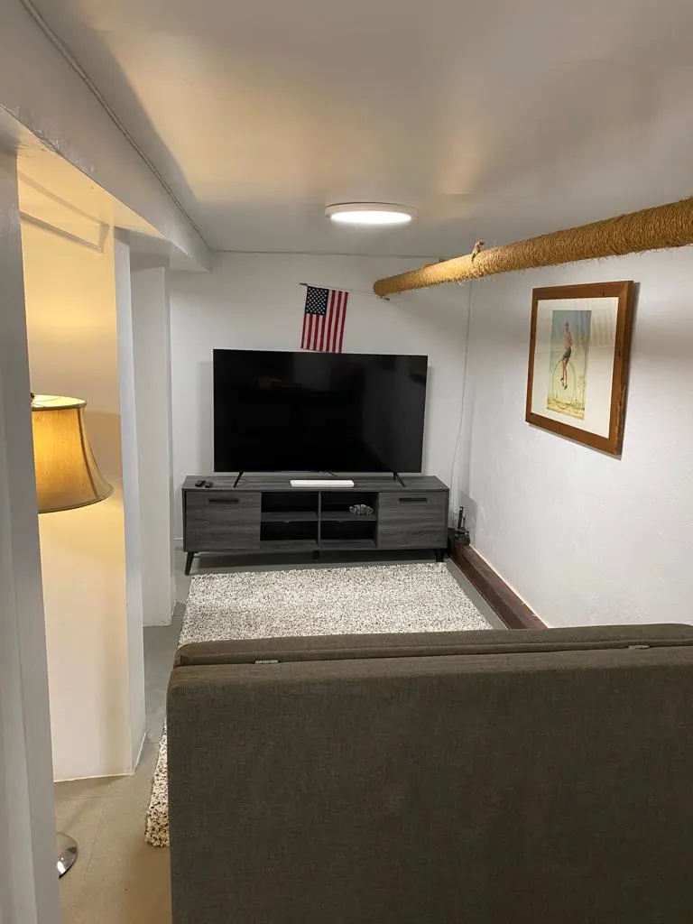 Cozy living room with TV.