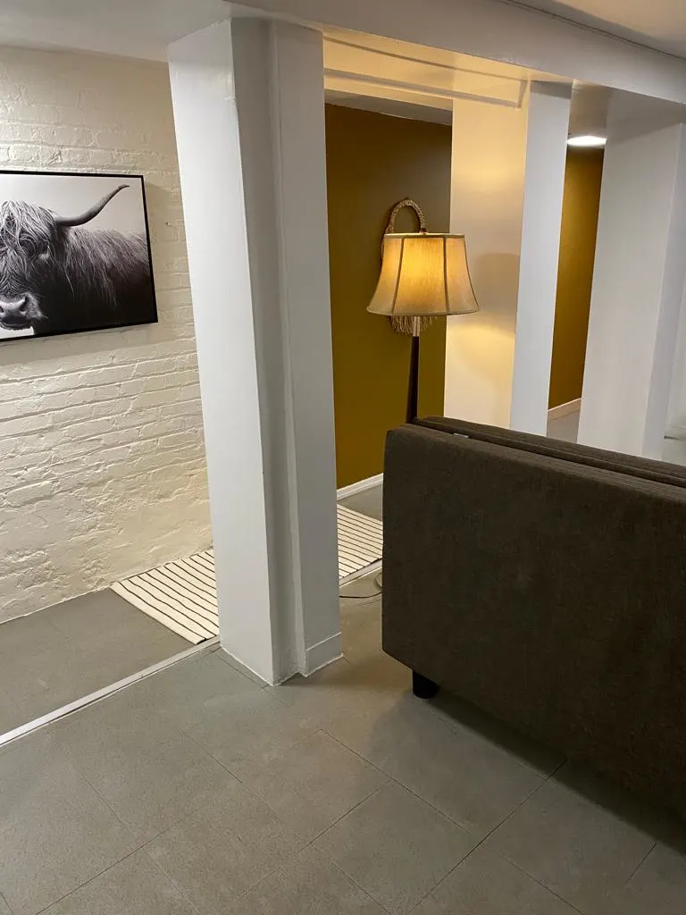 Cozy hallway with comfortable seating.