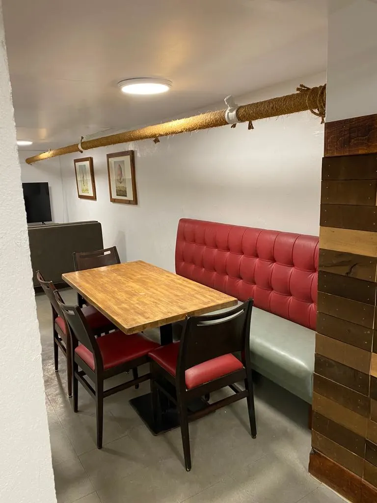 Cozy dining space with booth.