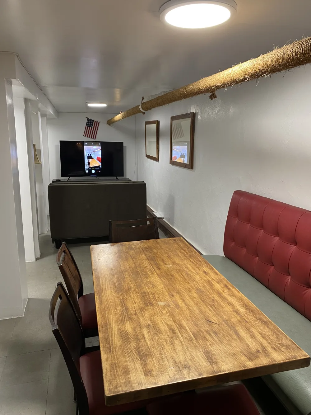 Cozy dining area with TV.