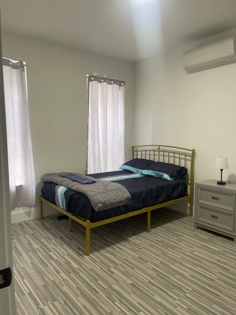 Cozy bedroom with modern decor.