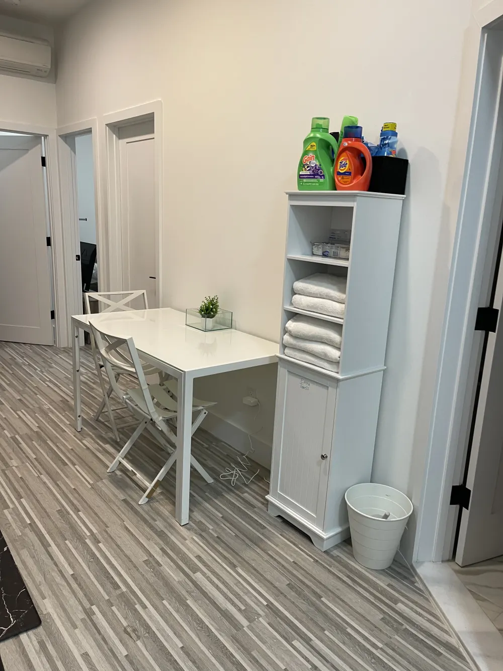 Clean and organized laundry area.