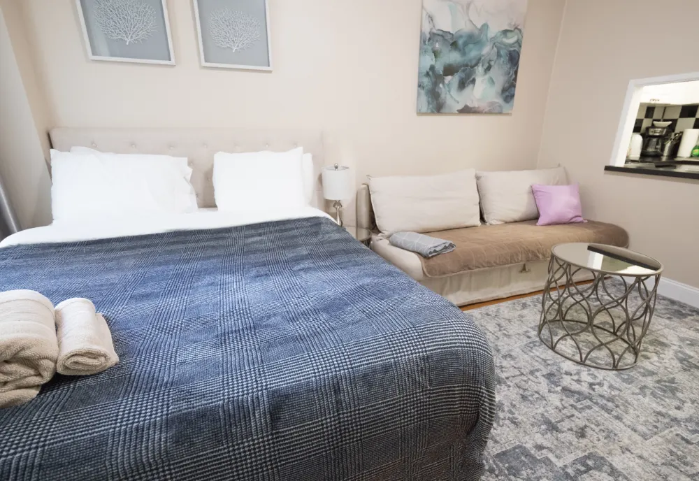 Cozy bedroom with modern furnishings.