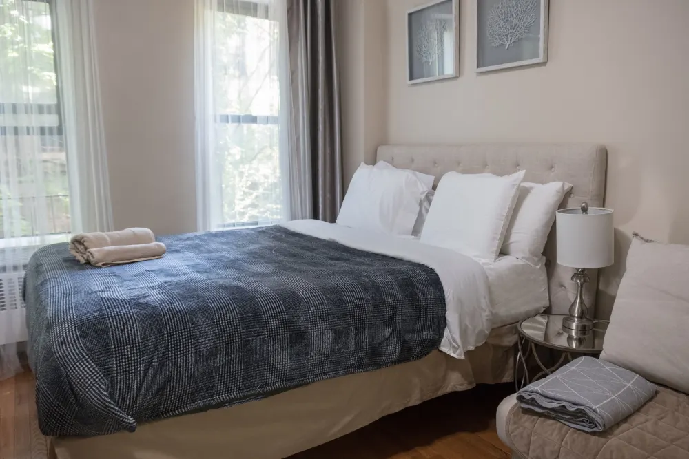 Cozy bedroom with natural light.