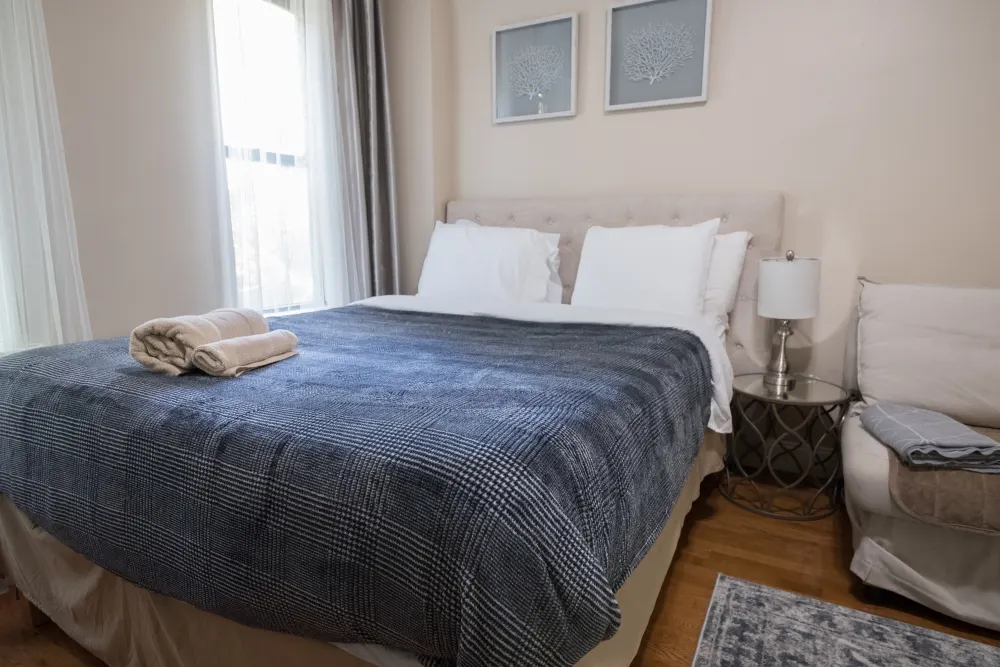 Cozy bedroom with modern furnishings.