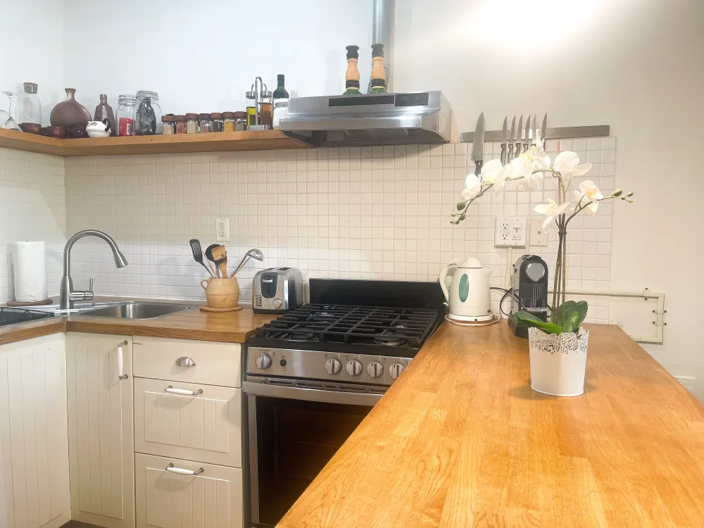 Modern kitchen with wooden countertops.