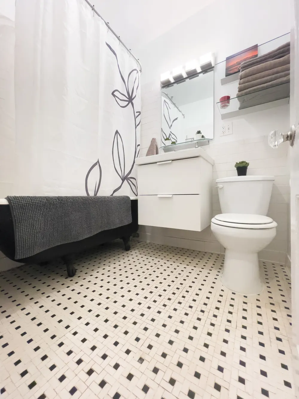 Modern bathroom with white decor.