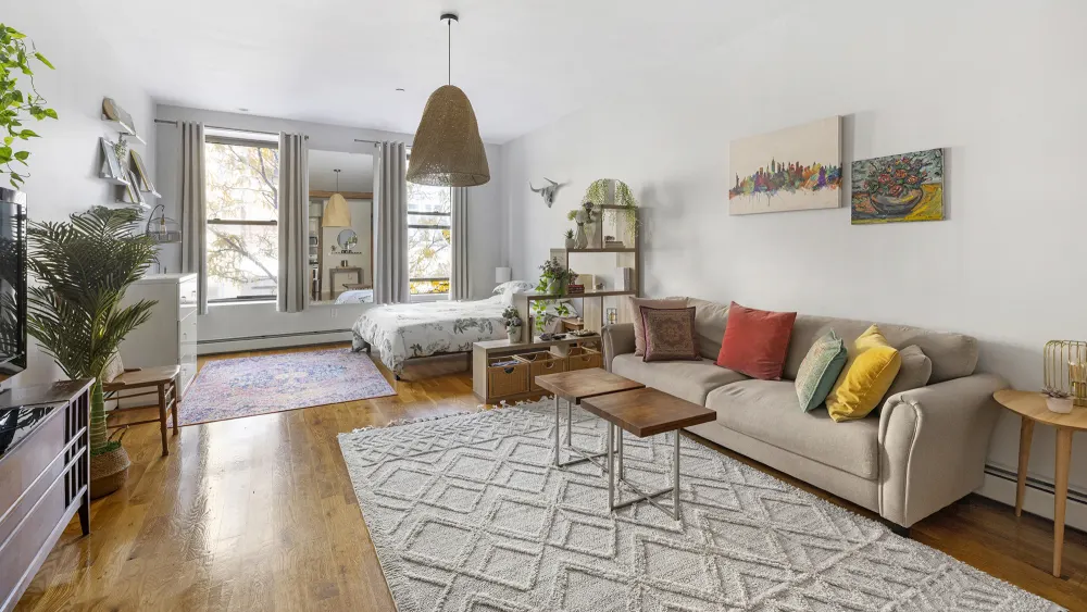 Bright, cozy studio apartment decor.