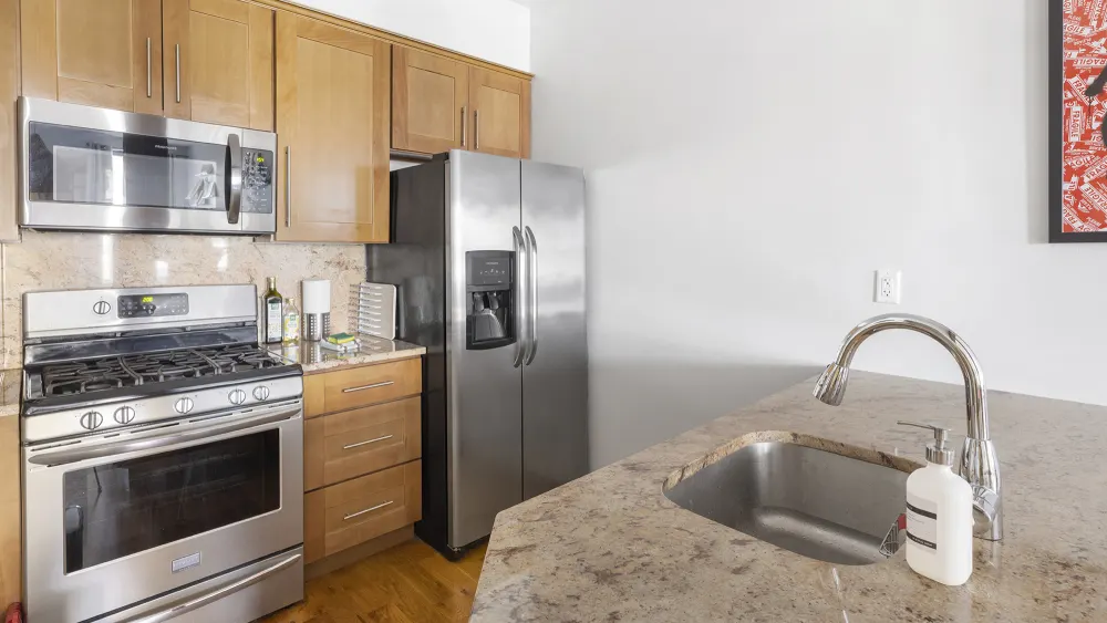 Modern kitchen with stainless steel appliances