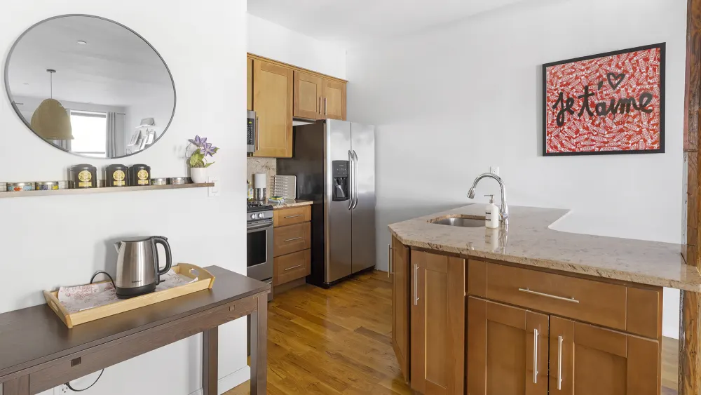 Modern kitchen with wooden cabinets.