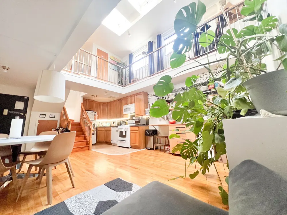 Spacious loft with modern kitchen.