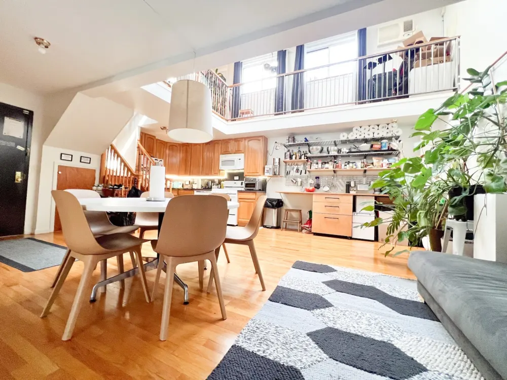 Modern open-concept kitchen and dining area.