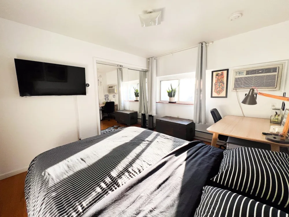 Cozy bedroom with modern decor.