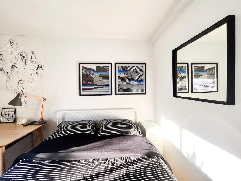 Modern bedroom with artistic decor.