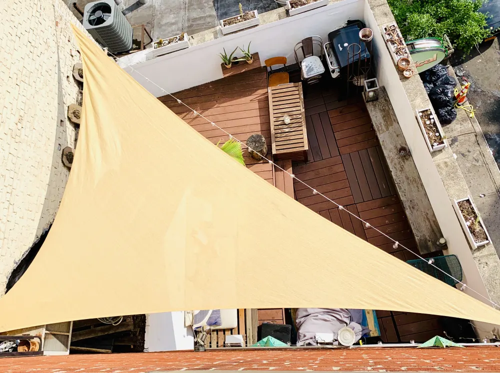 Cozy rooftop patio with seating.