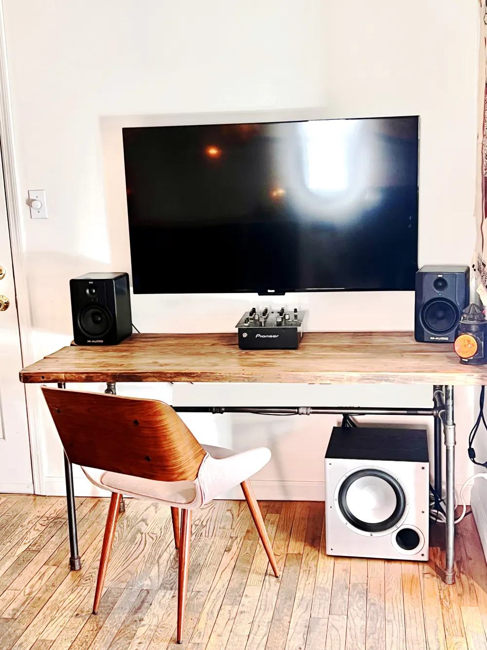 Modern desk setup with electronics.