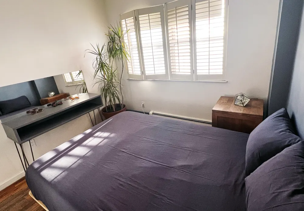 Cozy bedroom with natural light.