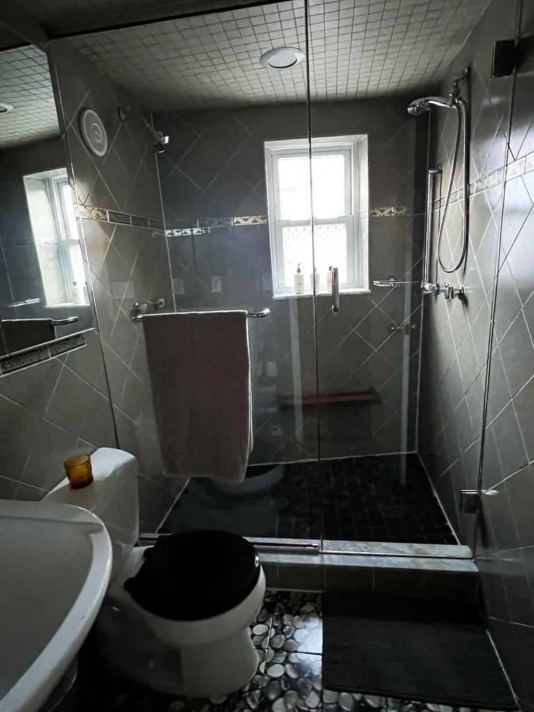 Modern bathroom with glass shower.