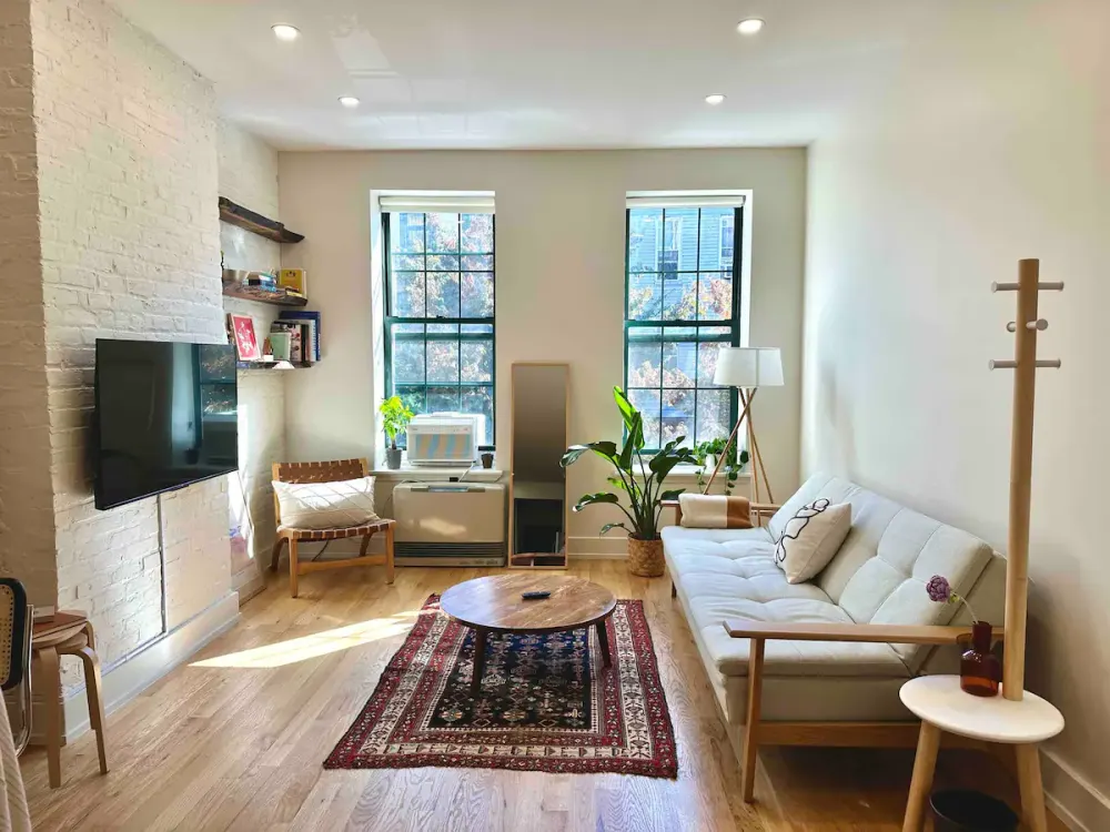 Bright, cozy living room setup.