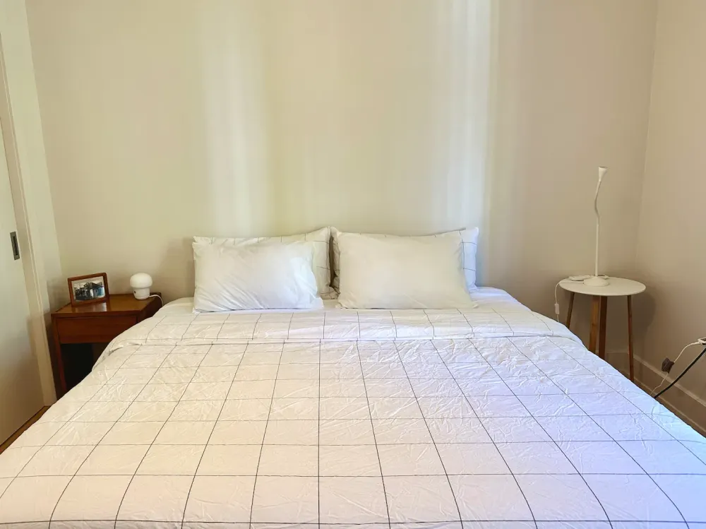 Cozy bedroom with minimalist decor.