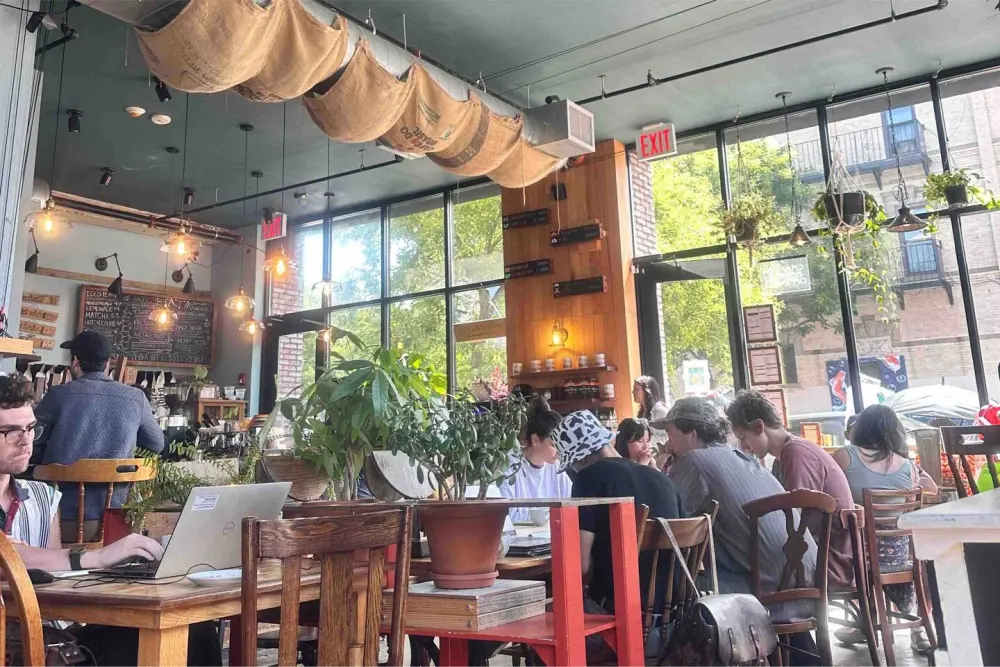Cozy cafe with indoor plants.