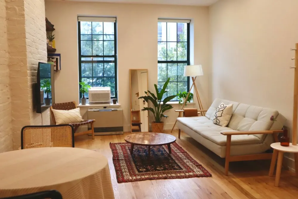 Cozy living room with plants.