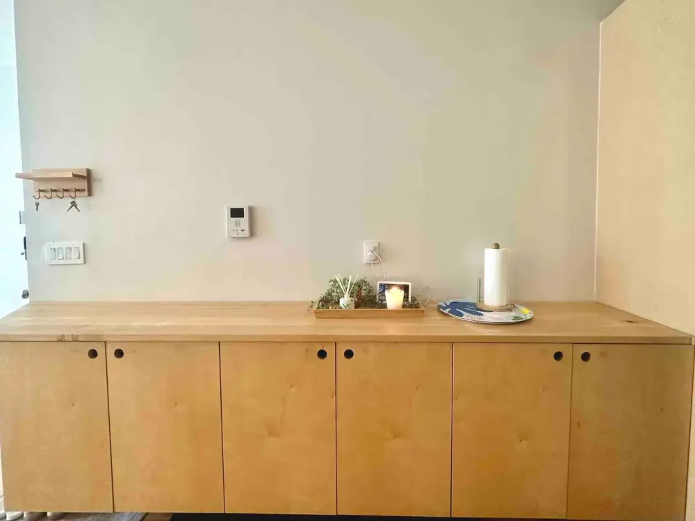 Wooden sideboard with minimalist decor.