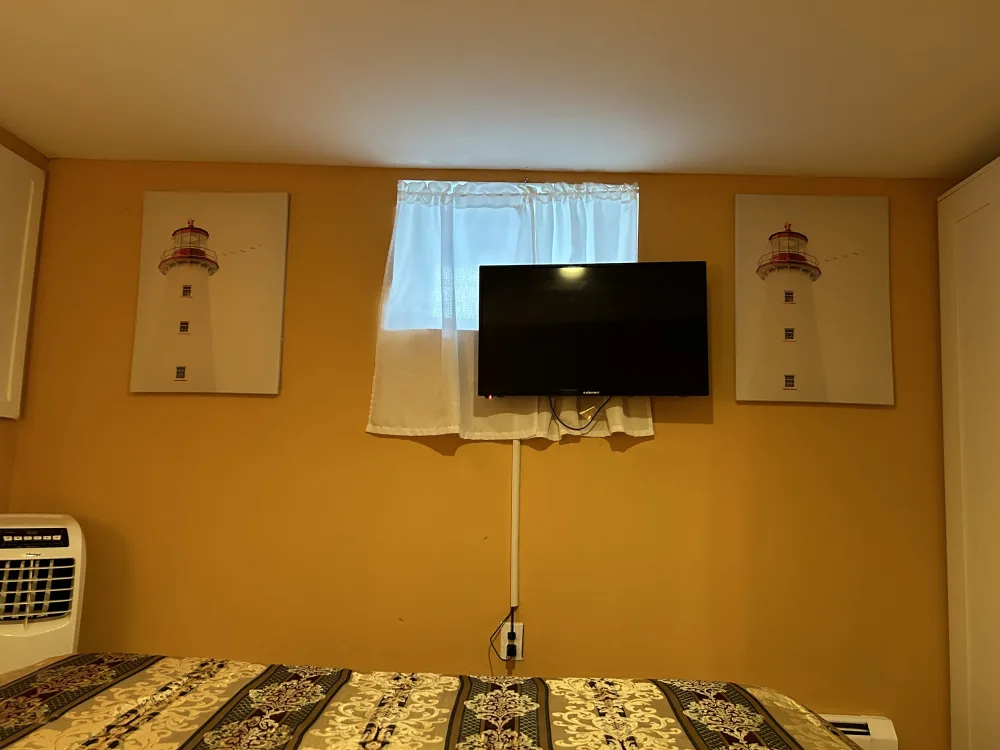 Cozy bedroom with decorative touches.