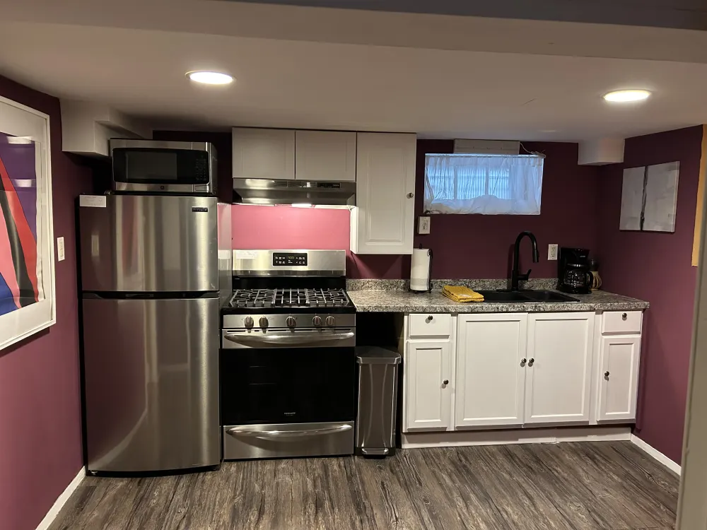 Compact kitchen with modern appliances.