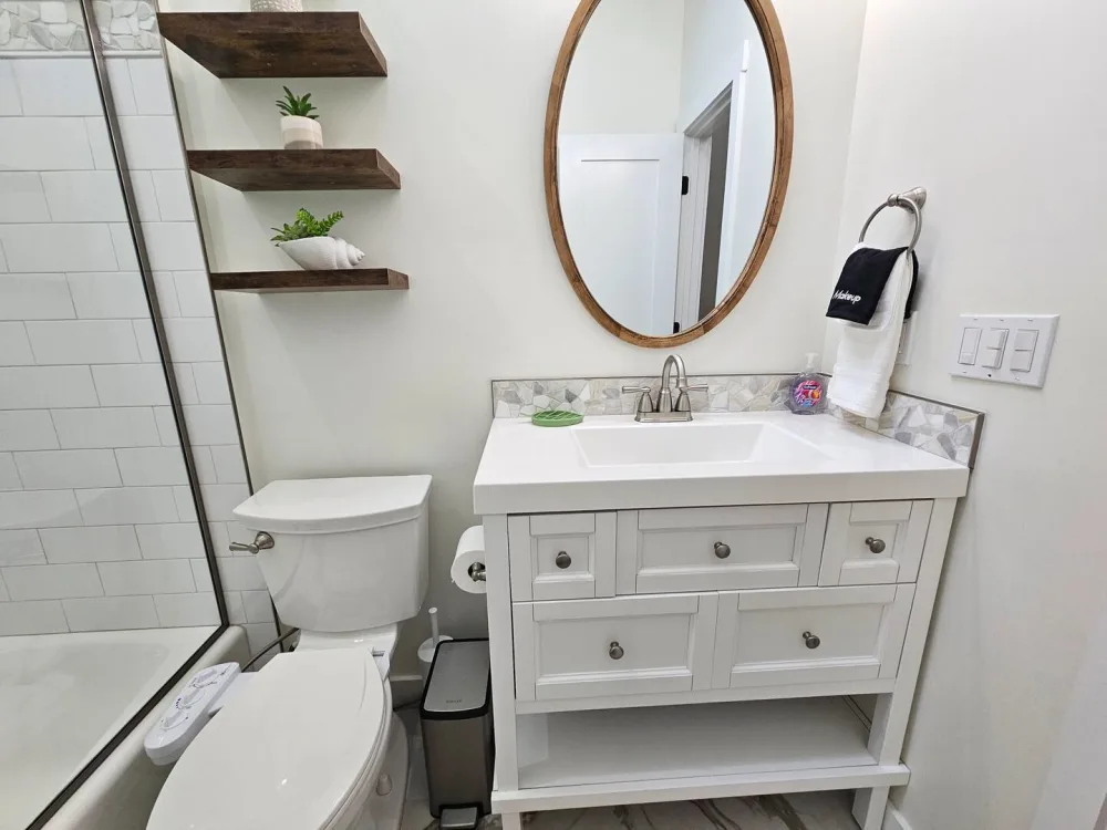 Modern bathroom with white decor.