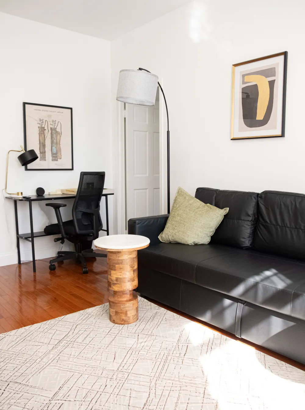 Modern living room with workspace.