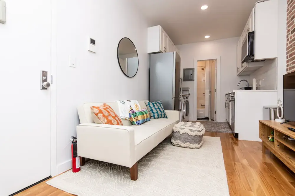 Modern studio apartment with cozy decor.