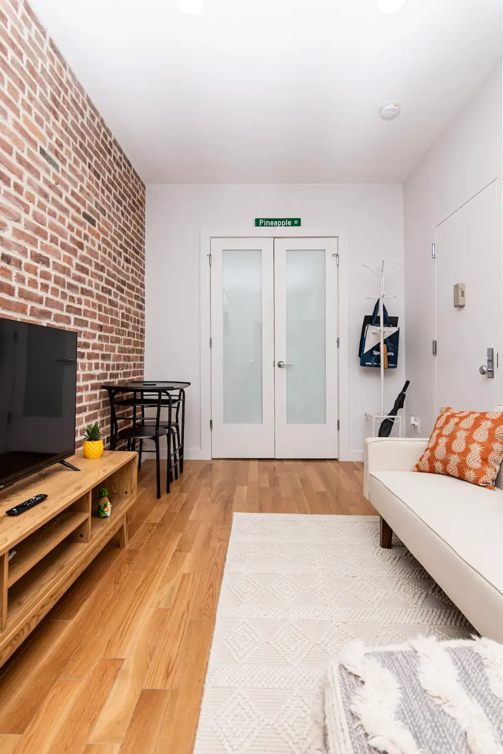 Modern living room with brick wall.