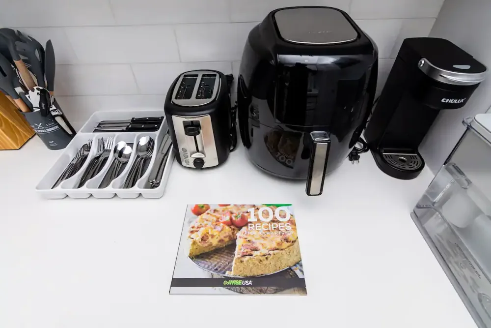 Kitchen counter with cooking appliances.