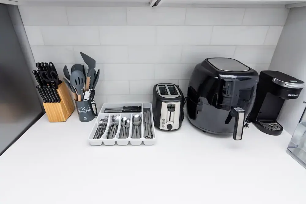 Modern kitchen essentials neatly organized.
