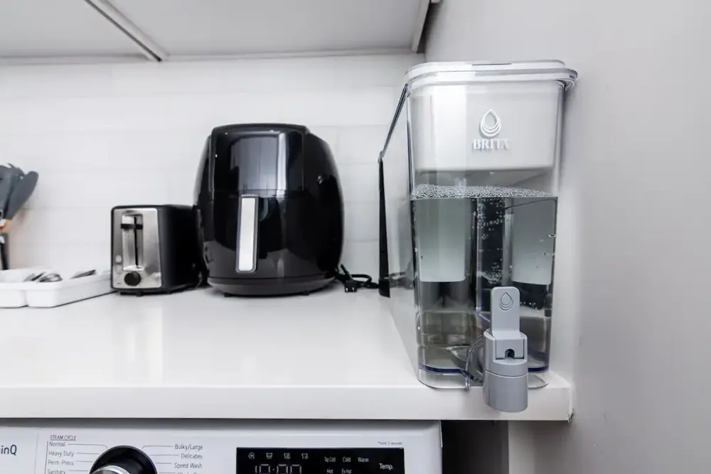 Modern kitchen with essential appliances.