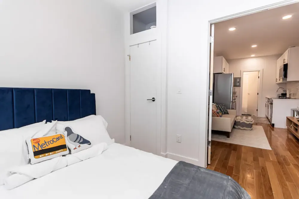 Modern bedroom with NYC-themed decor.