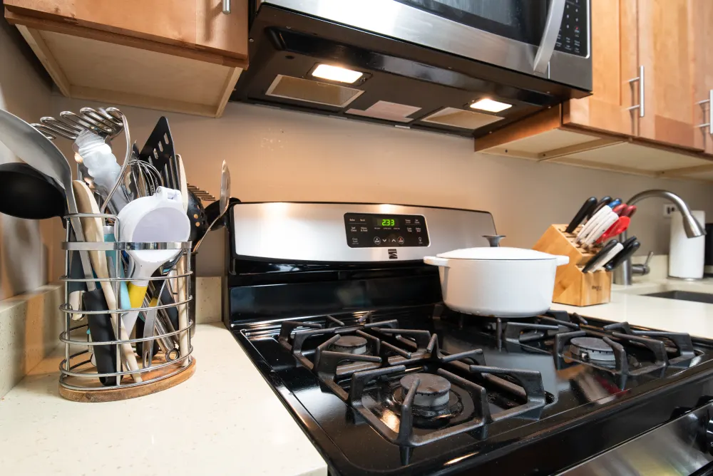 Modern kitchen with gas stove.