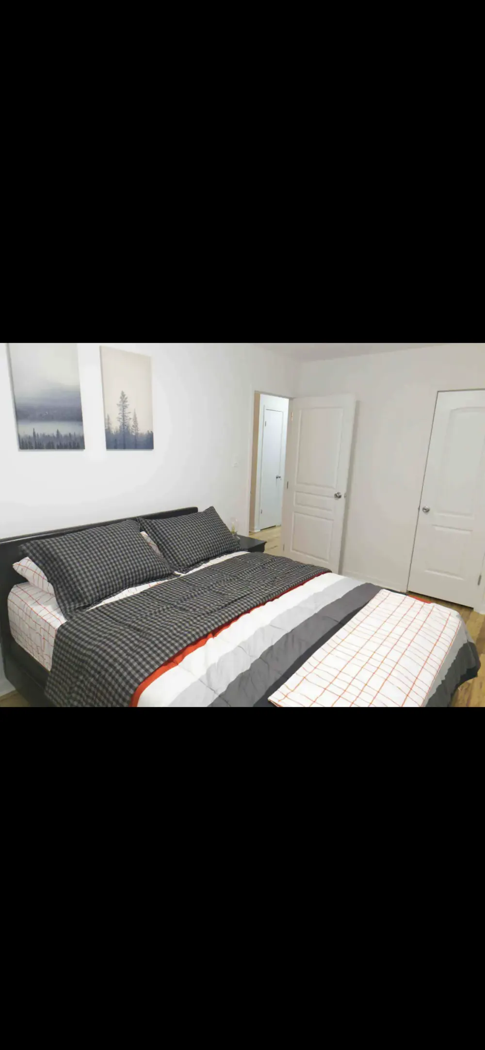 Cozy bedroom with modern decor.