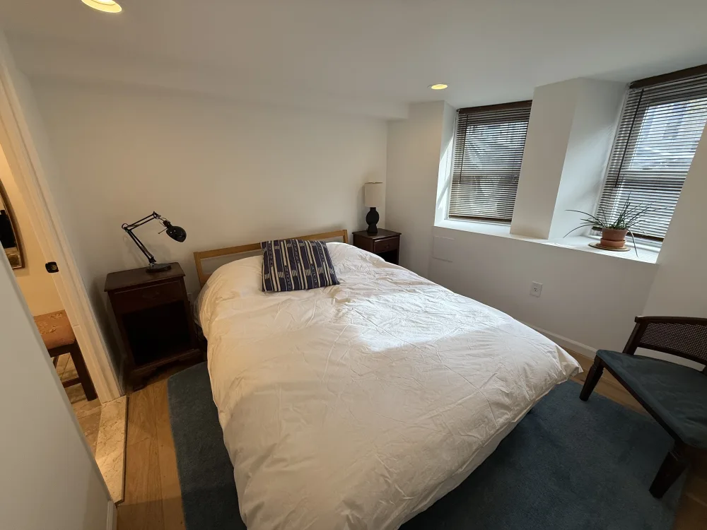 Cozy bedroom with natural light.
