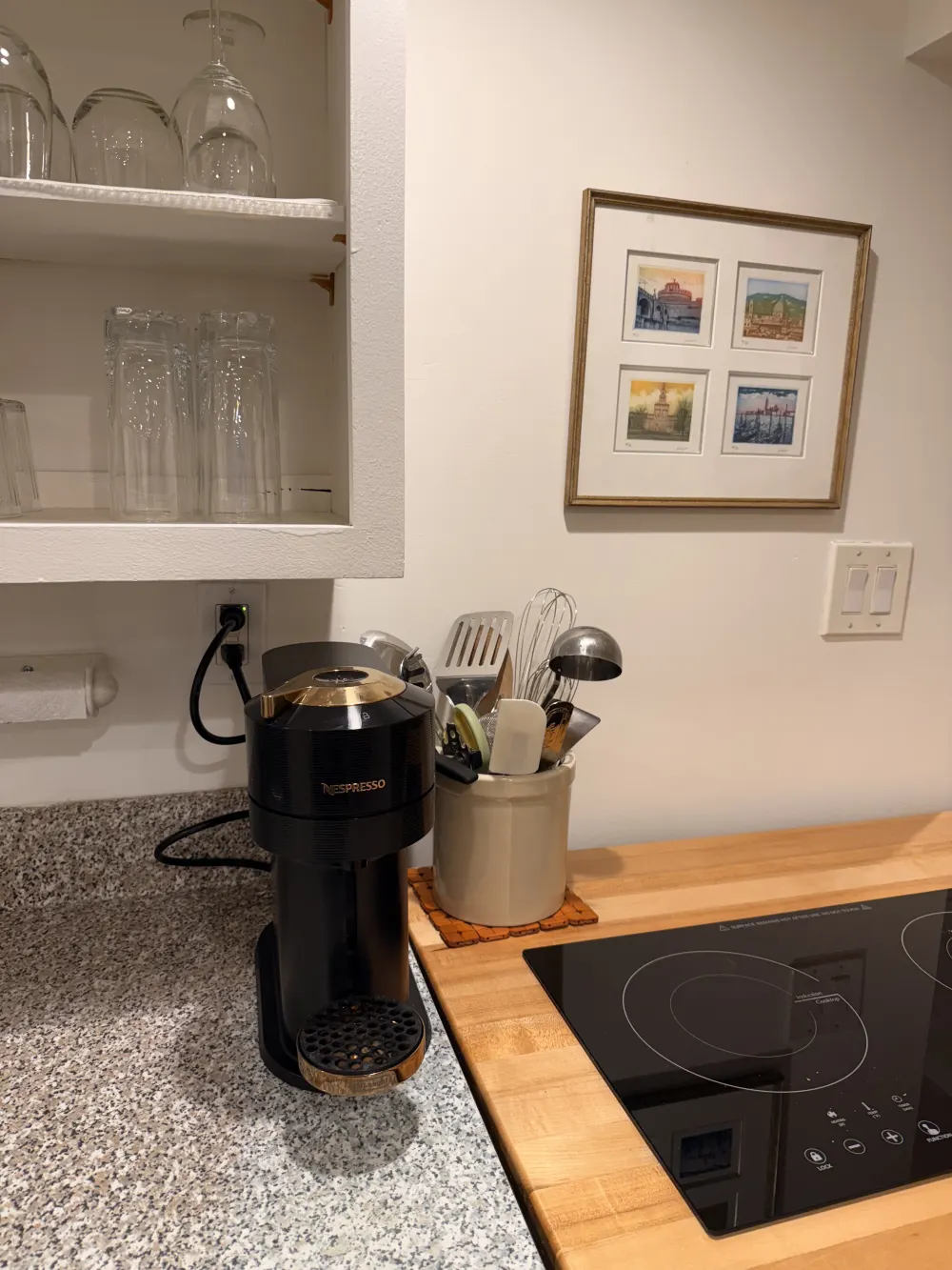 Kitchen corner with coffee machine.