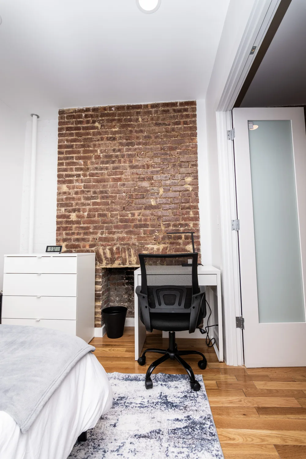 Modern room with exposed brick.