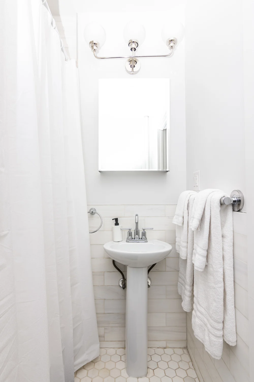 Bright, compact, and clean bathroom.