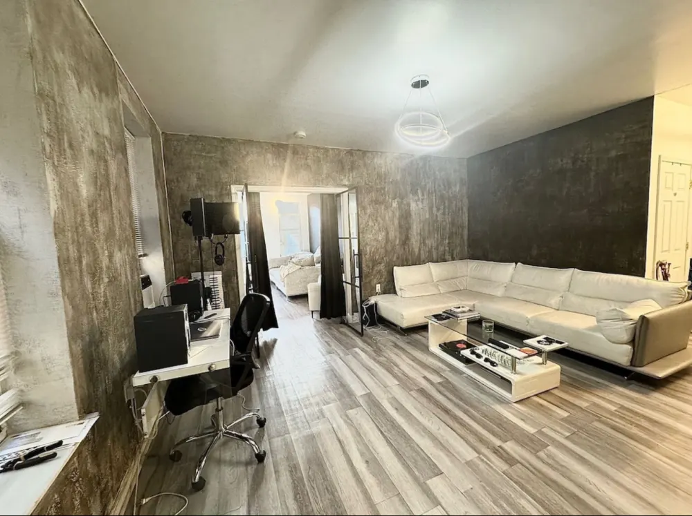 Modern living room with desk.