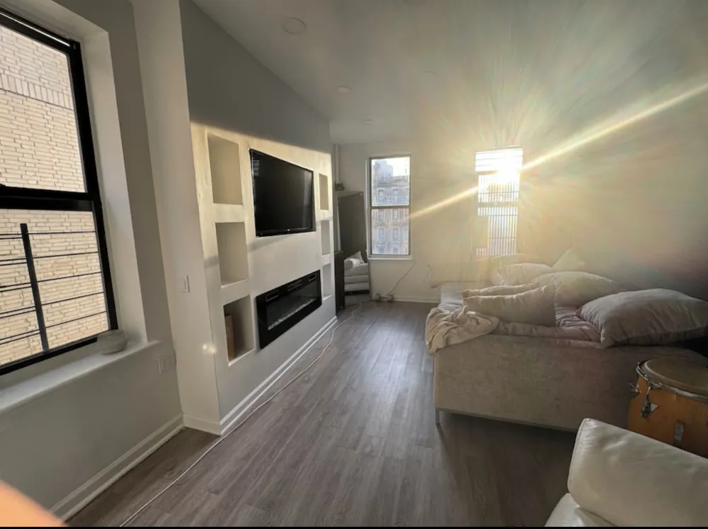 Modern, sunlit living room space.